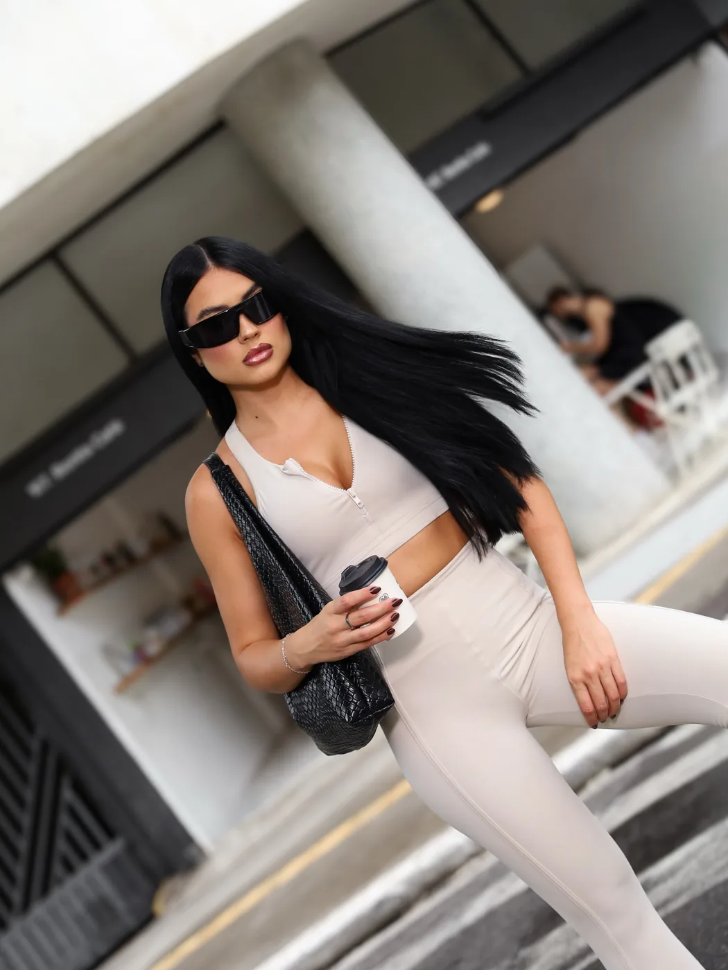 Raiany usando look de moda fitness da Kaisan